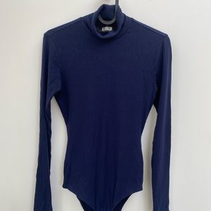 Brand new Reformation turtleneck jumpsuit in navy blue // Size S